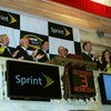NEW YORK - DECEMBER 03:  2008 NASCAR Sprint Cup Series Champion winner Jimmie Johnson (4L), driver of the #48 Lowe's Chevrolet, attends the opening bell with (L-R) Miss Sprint Anne-Marie Rhodes, team owner Rick Hendricks, Chairmen and CEO of Lowe's Robert