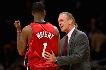 LOS ANGELES - FEBRUARY 28:  Dorell Wright #1 and head coach Pat Riley of the Miami Heat discuss a play near the sideline during the game against the Los Angeles Lakers on February 28, 2008 at Staples Center in Los Angeles, California.  The Lakers won 106-