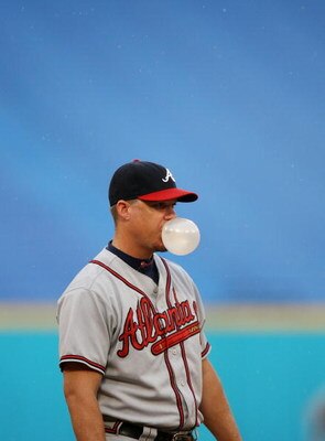 MIAMI - JULY 1:   Third baseman Chipper Jones #10 of the Atlanta Braves blows a bubble in between pitches against the Florida Marlins at Dolphin Stadium July 1, 2007 in Miami, Florida. The Marlins defeated the Braves 6-5 in ten innings. (Photo by Doug Ben