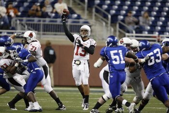 DETROIT - DECEMBER 5:  Quarterback Nate Davis #13 of the Ball State Cardinals throws a pass against the Buffalo Bulls during the MAC Championship game on December 5, 2008 at Ford Field in Detroit Michigan. (Photo by: Gregory Shamus/Getty Images)
