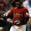 HOUSTON - JUNE 29:  Miguel Tejada #10 of the Houston Astros reacts after scoring a run against the Boston Red Sox in the 8th inning during Interleague MLB action on June 29, 2008 at Minute Maid Park in Houston, Texas.  (Photo by Ronald Martinez/Getty Imag