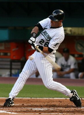 MIAMI - MAY 06:  Luis Gonzalez #26 of the Florida Marlins connects on one of his four hits in the game against the Milwaukee Brewers at Dolphin Stadium on May 6, 2008 in Miami, Florida. The Marlins defeated the Brewers 3-0.  (Photo by Doug Benc/Getty Imag