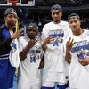 MEMPHIS, TN - MARCH 15: (L to R) Antonio Anderson, Andre Allen, Shawn Taggart and Derrick Rose of the Memphis Tigers pose for a photo after winning their 3rd consecutive CUSA tournament against the Tulsa Golden Hurricane during the finals of the Conferenc