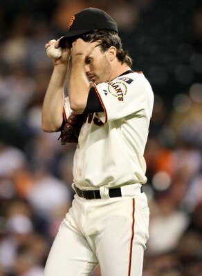 SAN FRANCISCO - SEPTEMBER 24:  Barry Zito #75 of the San Francisco Giants wipes his brow after giving up a run in the first inning against the San Diego Padres September 24, 2007 at AT&T Park in San Francisco, California.   (Photo by Jed Jacobsohn/Getty I