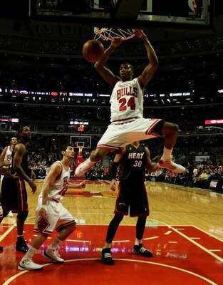 CHICAGO - FEBRUARY 12:  Tyrus Thomas #24 of the Chicago Bulls dunks the ball against the Miami Heat on February 12, 2009 at the United Center in Chicago, Illinois. NOTE TO USER: User expressly acknowledges and agreees that, by downloading and/or using thi