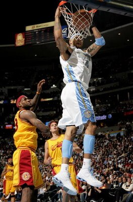 DENVER - DECEMBER 19:   Kenyon Martin #4 of the Denver Nuggets dunks in front of LeBron James #23 of the Cleveland Cavaliers during NBA action at the Pepsi Center on December 19, 2008 in Denver, Colorado.  NOTE TO USER: User expressly acknowledges and agr
