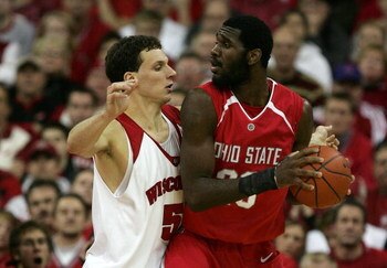 MADISON, WI - JANUARY 09:  Greg Oden #20 of the Ohio State Buckeyes looks to pass the ball out of the post against Jason Chappell #5 of the Wisconsin Badgers during their Big Ten Conference game on January 9, 2007 at the Kohl Center in Madison, Wisconsin.