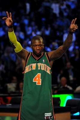 PHOENIX - FEBRUARY 14:  Nate Robinson of the New York Knicks waves to the crowd after winning the Sprite Slam Dunk Contest on All-Star Saturday Night, part of 2009 NBA All-Star Weekend at US Airways Center on February 14, 2009 in Phoenix, Arizona.  NOTE T