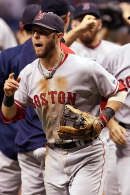 ST PETERSBURG, FL - OCTOBER 18:  Dustin Pedroia #15 of the Boston Red Sox celebrates after defeating the Tampa Bay Rays in game six of the American League Championship Series during the 2008 MLB playoffs on October 18, 2008 at Tropicana Field in St Peters