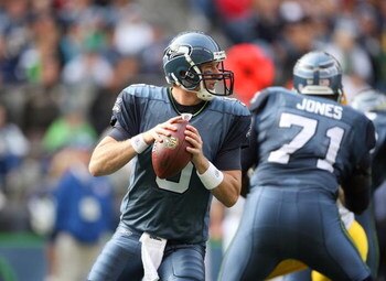 SEATTLE - OCTOBER 12:  Quarterback Charlie Frye #5 of the Seattle Seahawks looks to make a pass play during the game against the Green Bay Packers on October 12, 2008 at Qwest Field in Seattle, Washington. The Packers defeated the Seahawks 27-17. (Photo b