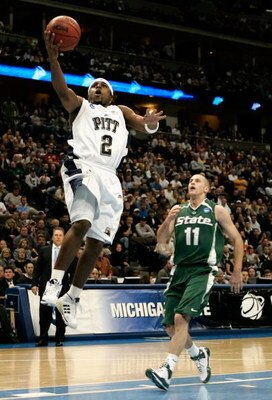 DENVER - MARCH 22:  Levance Fields #2 of the Pittsburgh Panthers lays up a shot past Drew Neitzel #11 of the Michigan State Spartans during the second round game of the South Regional as part of the 2008 NCAA Men's Basketball Tournament at Pepsi Center Ma