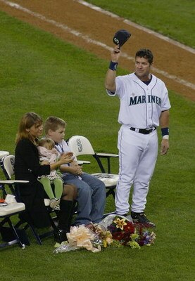 SEATTLE, WA - OCTOBER 2:  Edgar Martinez #11 of the Seattle Mariners (and his family) acknowledges the crowd during a post game ceremony honoring his 18 year career with the Mariners on October 2, 2004 at Safeco Field in Seattle, Washington.  (Photo by Li
