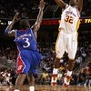 LOS ANGELES, CA - DECEMBER 02:  O.J. Mayo #32 of the USC Trojans puts up a shot over Russell Robinson #3 of the Kansas Jayhawks during the first half of the game at Galen Center on December 2, 2007 in Los Angeles, California.  (Photo by Christian Petersen