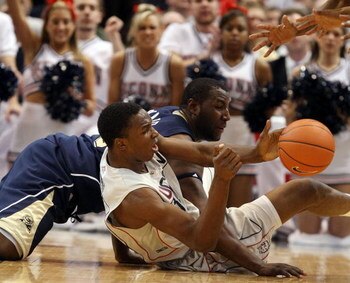 HARTFORD, CT - FEBRUARY 16:  Hasheem Thabeet #34 of the Connecticut Huskies and DeJuan Blair #45  of the Pittsburgh Panthers fight for the loose ball on February 16, 2009 at XL Center  in Hartford, Connecticut.  (Photo by Elsa/Getty Images)