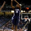 DETROIT - MARCH 28:  Corey Stokes #24 of the Villanova Wildcats attempts a shot against the Kansas Jayhawks during the Midwest Regional Semifinal of the 2008 NCAA Division I Men's Basketball Tournament at Ford Field on March 28, 2008 in Detroit, Michigan.