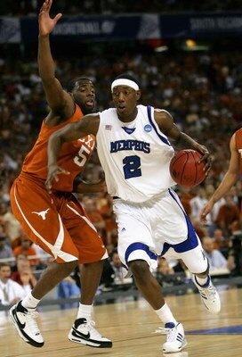 HOUSTON - MARCH 30:  Robert Dozier #2 of the Memphis Tigers drives the ball past Damion James #5 of the Texas Longhorns during the fourth round game of the South Regional as part of 2008 NCAA Men's Basketball Tournament at Reliant Stadium on March 30, 200