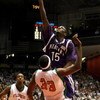 DAYTON, OH - MARCH 13:  Benson Egemonye #15 of the  Niagara Purple Eagles tries to get a shot off over Akini Adkins #33 of the Florida A&M Rattlers during the opening round of the Men's NCAA Tournament on March 13, 2007 at the University of Dayton Arena i
