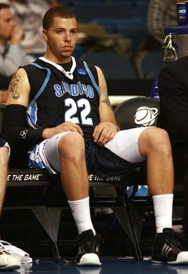 TAMPA, FL - MARCH 23:  Rob Jones #22 of the San Diego Toreros sits on the bench late in the game against the Western Kentucky Hilltoppers in the second round of the 2008 NCAA Tournament West Regional at the St. Pete Times Forum March 23, 2008 in Tampa, Fl
