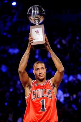 PHOENIX - FEBRUARY 14:  Derrick Rose of the Chicago Bulls holds up the trophy after winning the Play Station Skills Challenge on All-Star Saturday Night, part of 2009 NBA All-Star Weekend at US Airways Center on February 14, 2009 in Phoenix, Arizona.  NOT
