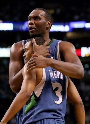 BOSTON - FEBRUARY 01:  Al Jefferson #25 and Sebastian Telfair #3 of Minnesota Timberwolves celebrate a foul called against the Boston Celtics on February 1, 2009 at TD Banknorth Garden in Boston, Massachusetts. NOTE TO USER: User expressly acknowledges an