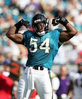 JACKSONVILLE, FL - NOVEMBER 13:  Linebacker Mike Peterson #54 of the Jacksonville Jaguars celebrates after sacking quarterback Kyle Boller #7 of the Baltimore Ravens on November 13, 2005 at Alltel Stadium in Jacksonville, Florida.  (Photo by Doug Benc/Get