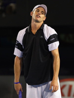 MELBOURNE, AUSTRALIA - JANUARY 29:  Andy Roddick of the United States of America reacts after a point in his semifinal match against Roger Federer of Switzerland during day eleven of the 2009 Australian Open at Melbourne Park on January 29, 2009 in Melbou