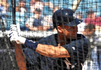 TAMPA - FEBRUARY 18: Infielder Derek Jeter #2 of the New York Yankees takes batting practice February 18, 2009 at the George Steinbrenner complex in Tampa, Florida. (Photo by Al Messerschmidt/Getty Images)