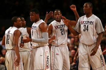 NEW YORK - MARCH 13:  A.J. Price #12, Craig Austrie #24, Jeff Adrien #4, Stanley Robinson #21 and Hasheem Thabeet #34  of the Connecticut Huskies looks on against the West Virginia Mountaineers during day two of the 2008 Big East Men's Basketball Champion