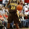 LAS VEGAS - JANUARY 17:  Brandon Ewing #23 of the Wyoming Cowboys brings the ball up the court during a game against the UNLV Rebels at the Thomas & Mack Center January 17, 2009 in Las Vegas, Nevada. UNLV won 83-66.  (Photo by Ethan Miller/Getty Images)