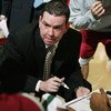 NORTHRIDGE, CA - FEBRUARY 23:  Head coach Tommy Dempsey of the Rider Broncos talks to his team during a timout in the game against the Cal State Northridge Matadors on February 23, 2008 at the Matadome in Northridge, California.  Rider won 73-72.  (Photo 