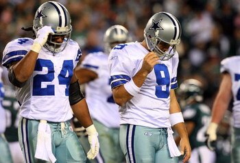 PHILADELPHIA - DECEMBER 28:  Tony Romo #9 and Marion Barber #24 of the Dallas Cowboys walk to the bench after losing possesion of the ball in the second half against the Philadelphia Eagles on December 28, 2008 at Lincoln Financial Field in Philadelphia, 