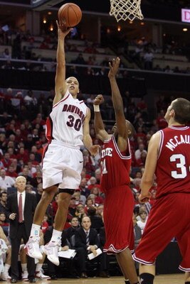 CHARLOTTE, NC - DECEMBER 6:  Stephen Curry #30 of the Davidson Wildcats goes up with the ball during the game against the North Carolina State Wolfpack at Time Warner Cable Arena on December 6, 2008 in Charlotte, North Carolina. (Photo by Streeter Lecka/G