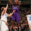 SACRAMENTO, CA - MARCH 15:  Daviin Davis #31 of the Weber State Wildcats puts up a shot over Michael Roll #20 of the UCLA Bruins during round one of the NCAA Men's Basketball Tournament at Arco Arena on March 15, 2007 in Sacramento, California.    (Photo 