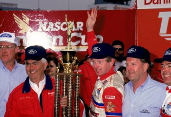 1 Jan 1993:  Team owner Junior Johnson, left, holds up the winners trophy with driver Bill Elliott after winning the race in Darlington, South Carolina.  Mandatory Credit: Bill Hall/ALLSPORT