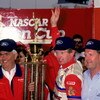 1 Jan 1993:  Team owner Junior Johnson, left, holds up the winners trophy with driver Bill Elliott after winning the race in Darlington, South Carolina.  Mandatory Credit: Bill Hall/ALLSPORT