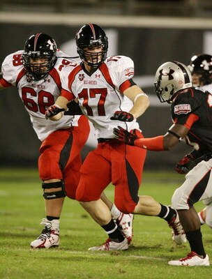 ORLANDO, FL - JANUARY 04:  Center Mark Brazinski #68 and tight end Arthur Lynch #17 of the white team lead the way on a running play in the All America Under Armour Football Game at Florida Citrus Bowl on January 4, 2009 in Orlando, Florida.  (Photo by Do