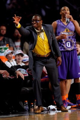 PHOENIX - FEBRUARY 13:  Assistant coach Dwyane Wade of the Rookie team celebrates a three-point shot during the T-Mobile Rookie Challenge & Youth Jam part of 2009 NBA All-Star Weekend at US Airways Center on February 13, 2009 in Phoenix, Arizona.  NOTE TO
