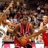WINSTON-SALEM, NC - FEBRUARY 26:  Farnold Degand #12 of the North Carolina State Wolfpack collides with teammates Ishmael Smith #10 and James Johnson #23 of the Wake Forest Demon Deacons during their game at Lawrence Joel Coliseum on February 26, 2009 in 