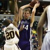 INDIANAPOLIS - MARCH 13:  Kevin Coble #44 of the Northwestern Wildcats looks to pass against Lawrence Westbrook #20 of the Minnesota Golden Gophers during the Big Ten Men's Basketball Tournament at Conseco Fieldhouse on March 13, 2008 in Indianapolis, Ind