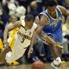 BERKELEY, CA - FEBRUARY 28: Josh Shipp #3 of the UCLA Bruins battles for the ball with Jerome Randle #3 of the California Golden Bears during an NCAA Pac-10 basketball game on February 28, 2009 at Haas Pavillion in Berkeley, California.  (Photo by Jed Jac