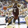 KANSAS CITY, MO - MARCH 15:  Bryan Davis #0 of the Texas A&M Aggies dribbles against the Kansas Jayhawks during the semifinal game of the Big 12 Men's Basketball Tournament on March 15, 2008 at the Sprint Center in Kansas City, Missouri.  (Photo by Jamie 