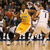 TAMPA, FL - MARCH 23:  Edwin Ubiles #23 of the Siena Saints brings the ball toward the basket agianst Scottie Reynolds #1 of the Villanova Wildcats in the second round of the 2008 NCAA Tournament Midwest Regional at the St. Pete Times Forum on March 23, 2
