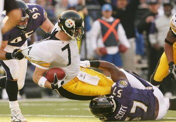 BALTIMORE - NOVEMBER 26:  Ben Roethlisberger #7 of the Pittsburgh Steelers is sacked by Jarret Johnson #95 and Bart Scott #57 of the Baltimore Ravens at M & T Bank Stadium November 26, 2006 in Baltimore, Maryland.  (Photo by Nick Laham/Getty Images)