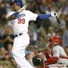 LOS ANGELES, CA - OCTOBER 15:  Manny Ramirez #99 of the Los Angeles Dodgers swings at a pitch in the eighth inning against the Philadelphia Phillies in Game Five of the National League Championship Series during the 2008 MLB playoffs on October 15, 2008 a