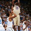 WESTWOOD, CA - FEBRUARY 19:  Quincy Pondexter #20 of the Washington Huskies goes up for the jump shot against Josh Shipp #3 of the UCLA Bruins in the first half during their NCAA basketball game at Pauley Pavilion February 19, 2009 in Westwood, California