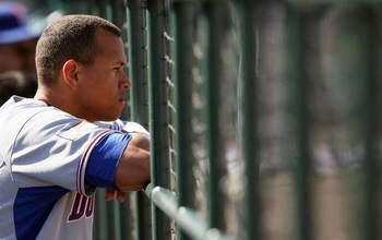 JUPITER, FL - MARCH 3:  Alex Rodriguez #13 of the Dominican Republic watches his team take on the Florida Marlins during an exhibition game at Roger Dean Stadium March 3, 2009 in Jupiter, Florida.  (Photo by Doug Benc/Getty Images)