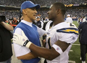 INDIANAPOLIS - JANUARY 13:  Head coach Tony Dungy of the Indianapolis Colts congratulates LaDainian Tomlinson #21 of the San Diego Chargers after the CHargers defeated the Colts 28-24 during their AFC Divisional Playoff game at the RCA Dome on January 13,
