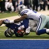IRVING, TX - JANUARY 13:  Runningback Ahmad Bradshaw #44 of the New York Giants is tackled by the Dallas Cowboys in the NFC Divisional Playoff game at Texas Stadium on January 13, 2008 in Irving, Texas. The Giants defeated the Cowboys 21-17.  (Photo by Ro