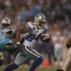 CHARLOTTE, NC - DECEMBER 22:  Patrick Crayton #84 of the Dallas Cowboys tries to break a tackle against the Carolina Panthers during their game at Bank of America Stadium on December 22, 2007 in Charlotte, North Carolina. (Photo by Streeter Lecka/Getty Im