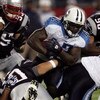 FOXBOROUGH, MA - AUGUST 17:  Chris Henry #42 of the Tennessee Titans carries the ball during the first half of a pre-season game against the New England Patriots at Gillette Stadium August 17, 2007 in Foxborough, Massachusetts.  (Photo by Elsa/Getty Image